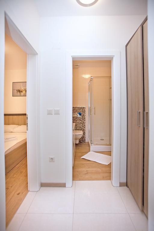 Apartments Maslina I Njivice Room photo