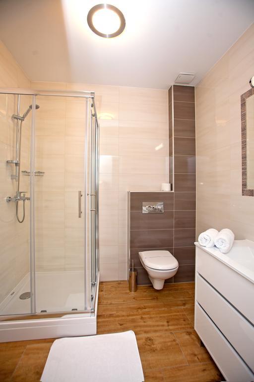 Apartments Maslina I Njivice Room photo